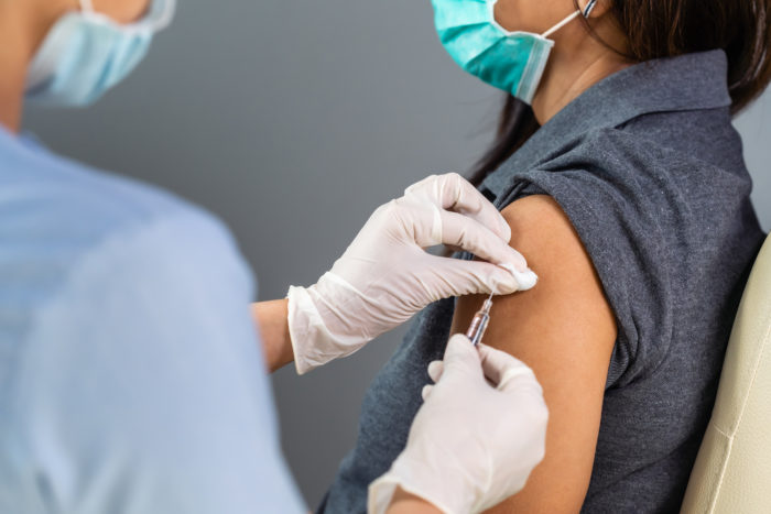 employee undergoing mandatory vaccine